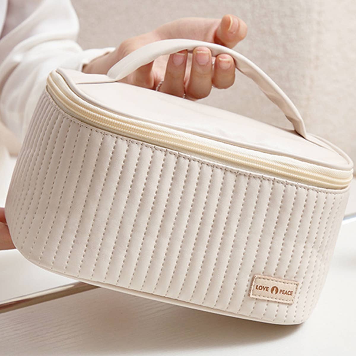 Quilted Oval Make Up Case