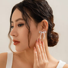 Load image into Gallery viewer, Pearl Bow Earrings
